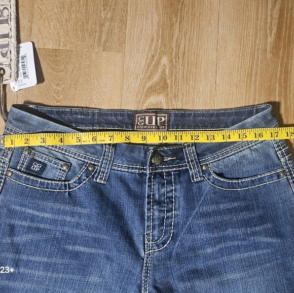 Classic Blue Boot Cut Jeans with Subtle Distressing - Picture 3 of 8